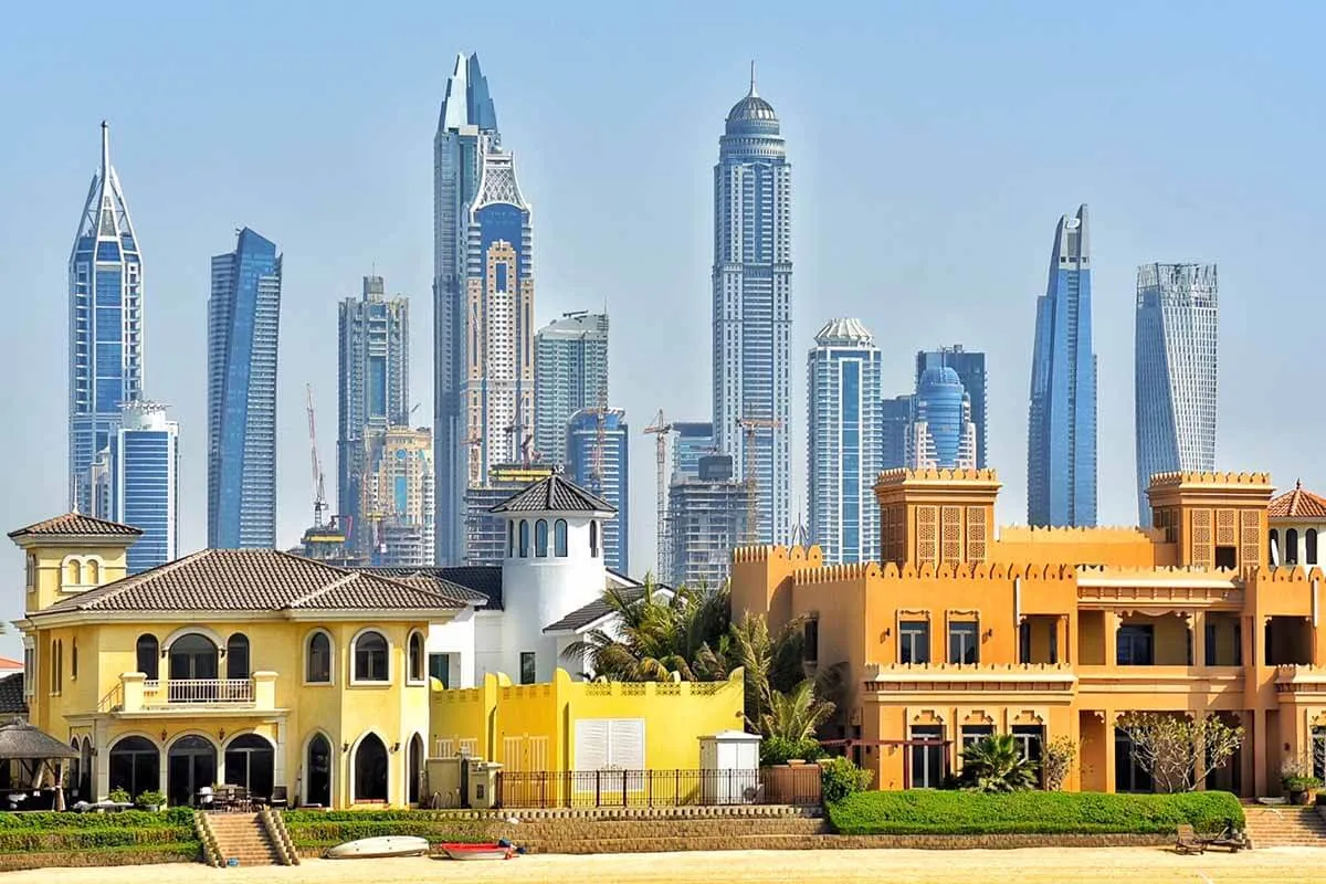 Aerial view of Dubai's luxury residential and leisure developments showcasing Dubai Investment' Properties modern villas and parks.