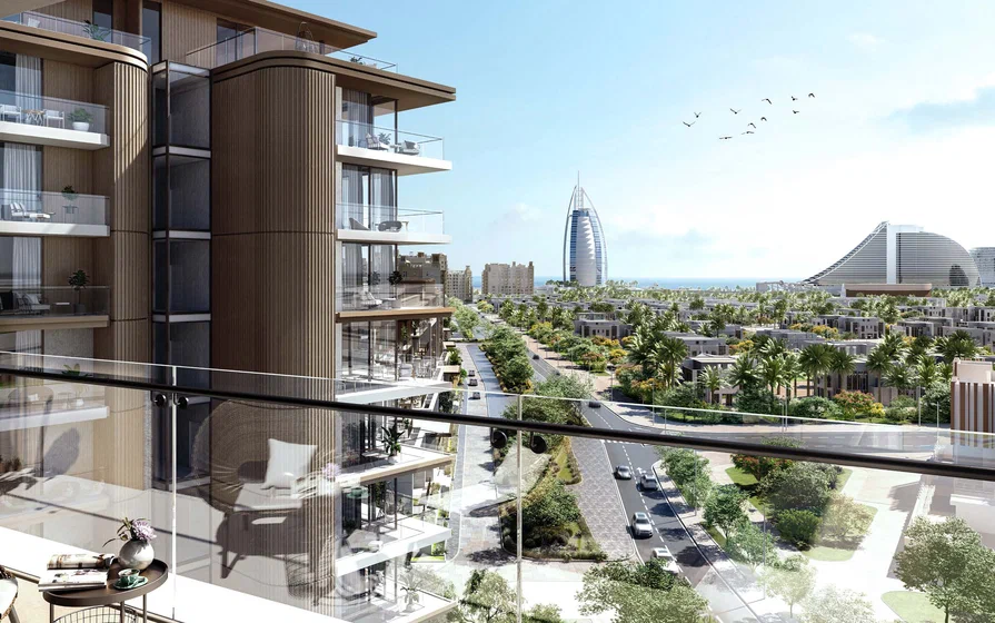 Dubai's modern apartment complexes and skyline presented at the Dubai Properties Investment exhibition, highlighting residential growth.